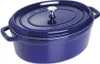 A blue oval Staub cast iron cocotte with a silver knob on the lid, shown from a slightly elevated side angle on a white background. Náhled obrázku produktu
