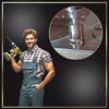 A man in overalls holding a drill, with a close-up of a drill bit in a circle. Podgląd zdjęcia produktu
