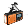 A portable emergency radio with a flashlight and crank. Náhled obrázku produktu
