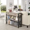 A console table with decorative items and storage bins placed in a living room setting next to a sofa. Produktbild-Vorschau