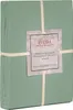 A neatly folded duvet cover is presented, tied with cream-colored ribbons and featuring a product tag. Produktbild-Vorschau