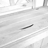 A close-up view of a wooden park bench with a storage compartment. Náhled obrázku produktu