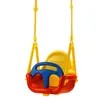 A colorful baby swing with a steering wheel. Voir les images du produit