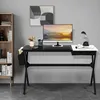 A modern home office setup featuring a black desk with a computer, lamp, and storage. Náhled obrázku produktu
