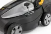 Close-up of a lawnmower's control panel and wheels. Produktbild-Vorschau