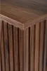 A close-up view of the corner of a dark brown wooden cabinet with vertical fluting. Anteprima dell’immagine prodotto
