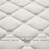 A close-up of a white mattress with a diamond-stitched pattern, featuring a hardness scale graphic. Anteprima dell’immagine prodotto