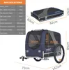A product image showing specifications and dimensions of a dog trailer, with two views of the trailer itself. Produktbild-Vorschau