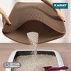 Hands holding a brown cat litter mat over a cat litter box, with litter falling out. Produktbild-Vorschau