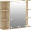 A studio product shot of a wall-mounted mirror with attached shelves and lights. Náhled obrázku produktu