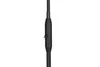 A close-up of the stem of a black floor lamp, showing a switch. Produktbild-Vorschau