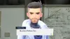 A video game character, Professor Turo, is shown in a lab setting, with a whiteboard in the background filled with scientific diagrams and equations. A dialogue box displays his name and a greeting. Náhled obrázku produktu