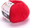 A ball of red yarn with a label. Voir les images du produit