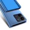 A close-up, angled view of a blue smartphone case with a clear view flip cover, showing the back camera module. Produktbild-Vorschau