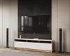 A modern living room setup featuring a TV stand with a television mounted above it. Náhled obrázku produktu