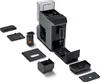 A disassembled coffee machine with its various parts laid out around the main unit. Produktbild-Vorschau