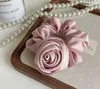 Rosa Frottee-Haargummi mit Rose Produktbild-Vorschau 8