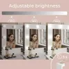 A makeup mirror with adjustable brightness settings shown in three different light intensities. Náhľad obrázku produktu