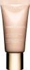 A tube of Clarins Instant Concealer with a gold cap, presented on a white background. Náhľad obrázku produktu