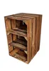 A wooden shelving unit made of crates, standing on a white background. Produktbild-Vorschau