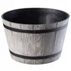 A light gray planter with a wood grain texture and black bands, shown against a white background. Podgląd zdjęcia produktu