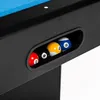 A close-up view of billiard balls in a pocket of a billiard table. Produktbild-Vorschau