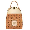 A product shot of an MCM perfume bottle designed to resemble a handbag. Anteprima dell’immagine prodotto