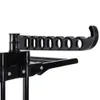 A close-up view of a black drying rack with multiple circular openings. Produktbild-Vorschau