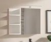 A white bathroom cabinet with a mirror and shelves, mounted on a light beige wall. Produktbild-Vorschau