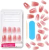 A set of artificial nails and application tools. Anteprima dell’immagine prodotto