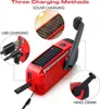 A red emergency radio with solar panel and hand crank, showing three charging methods: solar, USB, and hand crank. Produktbild-Vorschau