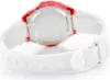 A close-up, slightly blurred view of the back of a white digital watch with a red bezel. Produktbild-Vorschau