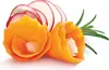 A close-up of creatively carved vegetables, including radishes and carrots, arranged with a sprig of rosemary. Produktbild-Vorschau