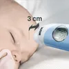 A close-up of a baby sleeping with a thermometer measuring their temperature. Produktbild-Vorschau