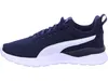 A side view of a navy blue Puma sneaker with a white stripe. Produktbild-Vorschau