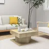 A modern living room with a white sofa, a wooden coffee table, and a potted plant. Voir les images du produit