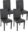 Four black dining chairs are arranged in a studio setting against a white background. Podgląd zdjęcia produktu