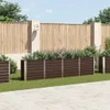 A garden scene with planters and a wooden fence. Produktbild-Vorschau