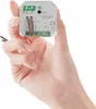A hand is holding a small electronic device. Produktbild-Vorschau