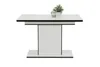 A white dining table with black trim, featuring a small potted plant and a glass jar on top. Produktbild-Vorschau