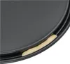 A close-up view of the edge of a dark gray round baking pan with a beige strip of dough inserted into a groove. Anteprima dell’immagine prodotto