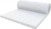 A white mattress topper is shown rolled up on one end and unrolled on the other. Produktbild-Vorschau