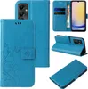 A collage of images showing a blue flip phone case with floral and butterfly designs from multiple angles. Produktbild-Vorschau