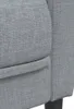 A close-up view of the textured fabric of a gray armchair. Produktbild-Vorschau