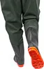 Close-up view of the lower legs and boots of someone wearing waders. Produktbild-Vorschau