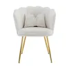 A white velvet accent chair with a scalloped back and a decorative bow pillow, set against a white background. Náhled obrázku produktu