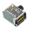 A close-up, isolated shot of a voltage regulator with a metal casing and a black knob. Náhled obrázku produktu