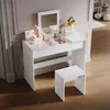 A white vanity table with a mirror and a stool in a room. Podgląd zdjęcia produktu