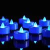 A group of blue LED tealight candles on a black reflective surface. Náhled obrázku produktu