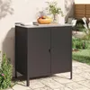 An outdoor cabinet is shown on a patio with plants and furniture in the background. Produktbild-Vorschau